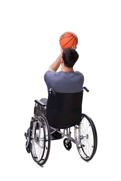 Basketball Player Recovering From Injury On Wheelchair