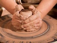 Hands Forming Clay