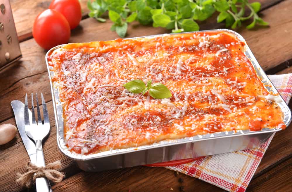 homemade lasagna in foil pan