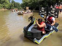 cardboard boats on river