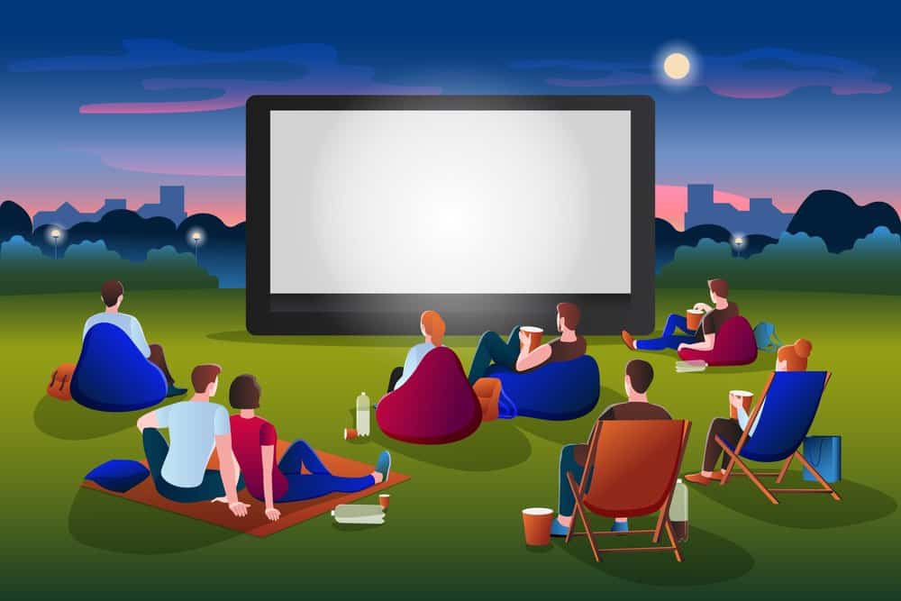 illustration of people watching an outdoor movie at dusk