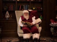 Santa reading a book