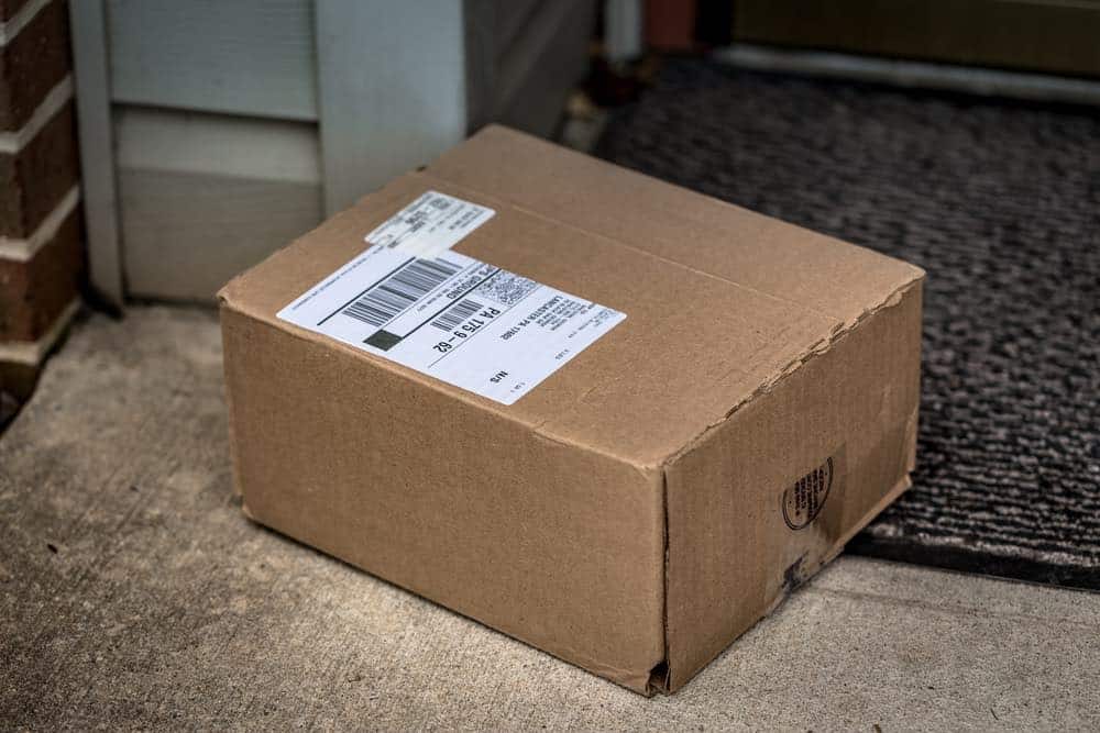 Brown package delivered to front door