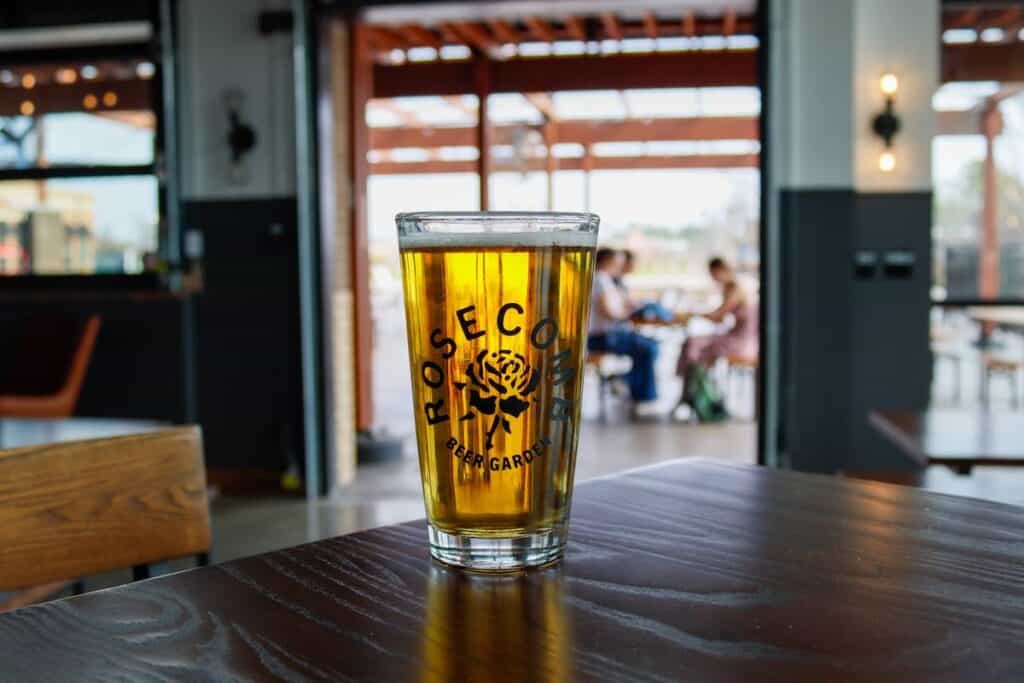 pint glass with Rosecomb Beer Garden logo