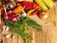 Fresh produce on a wooden cutting board