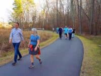 people walking on a trail