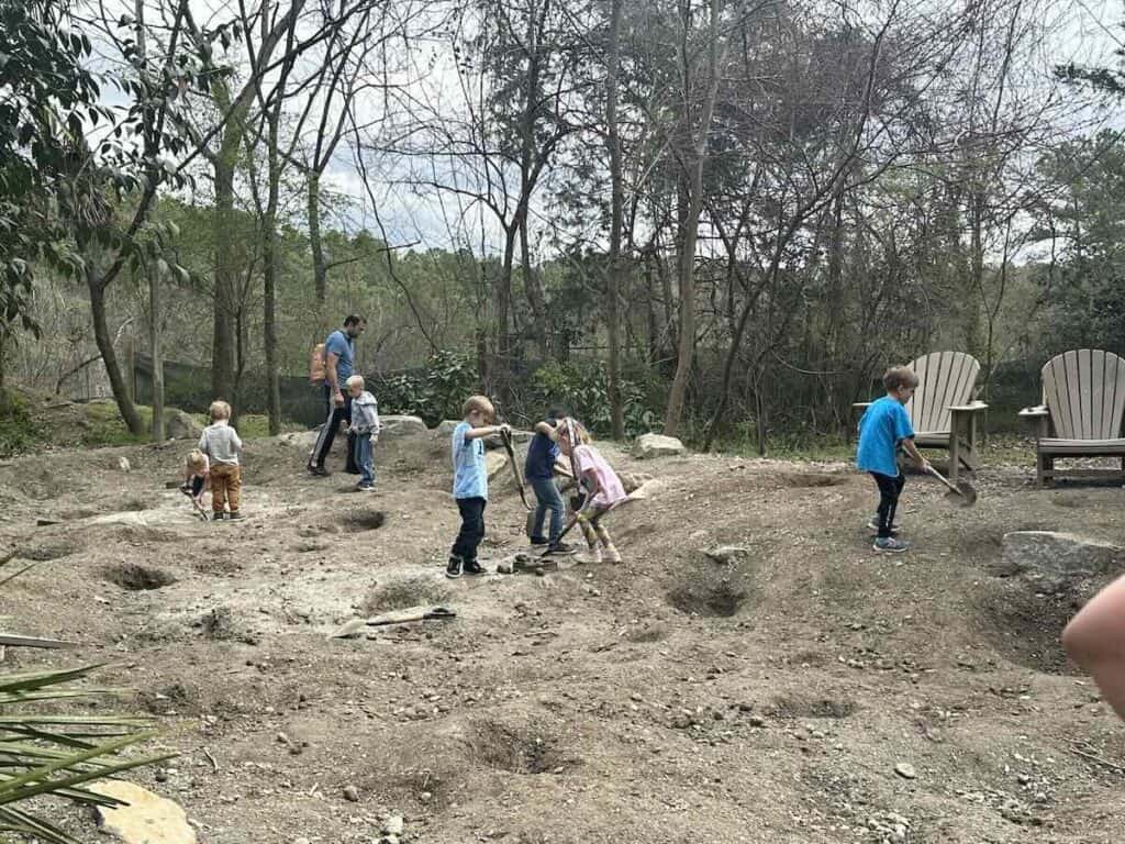 Kids digging for fossils at Museum of Life and Science