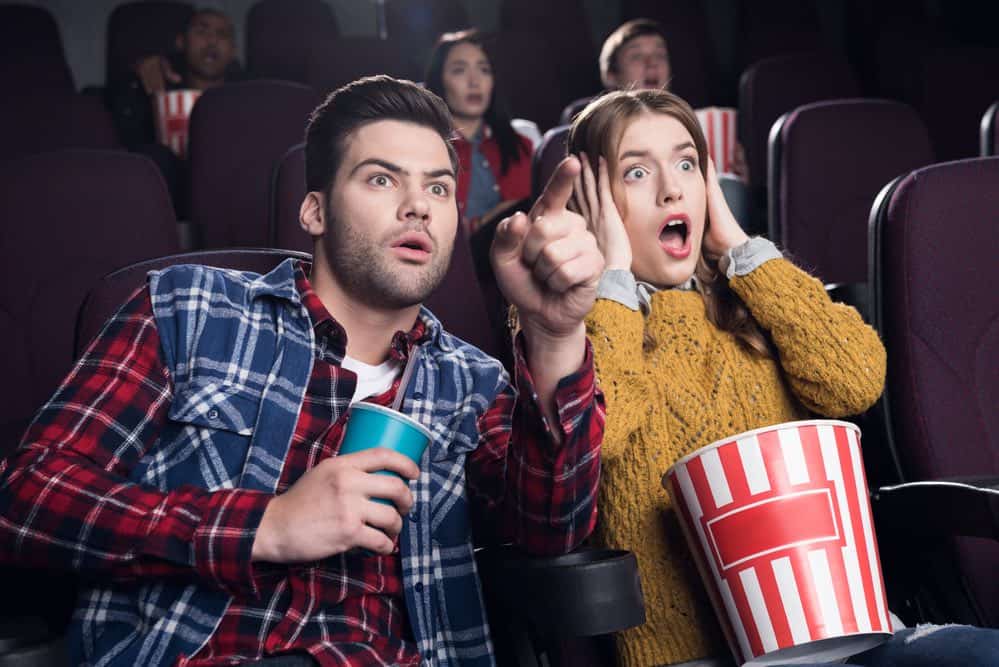 couple watching a scary movie