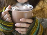 woman with cup of hot cocoa