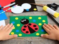 Child making ladybug craft