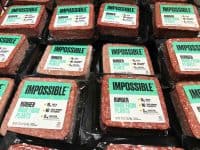 Packages of Impossible Burgers in grocery store
