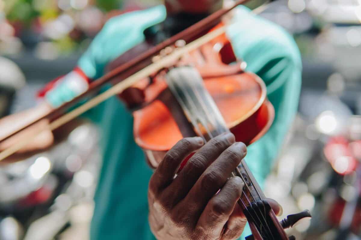 closeup of man playing violin
