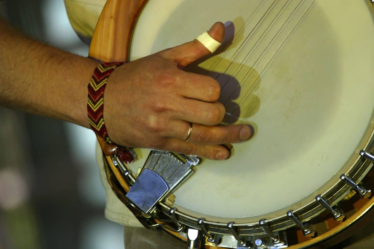 Close-up of a man playing a banjo