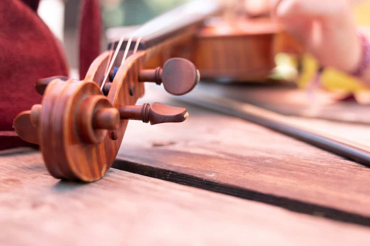Violin on table outdoors, close-up