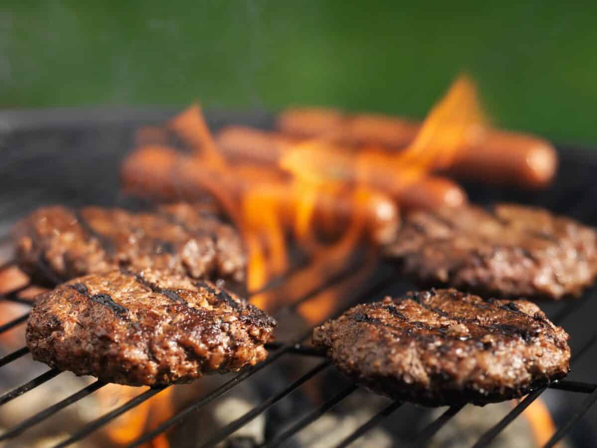 Hamburgers and hot dogs on grill