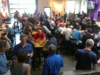Interior of Crank Arm Brewing, with crowd