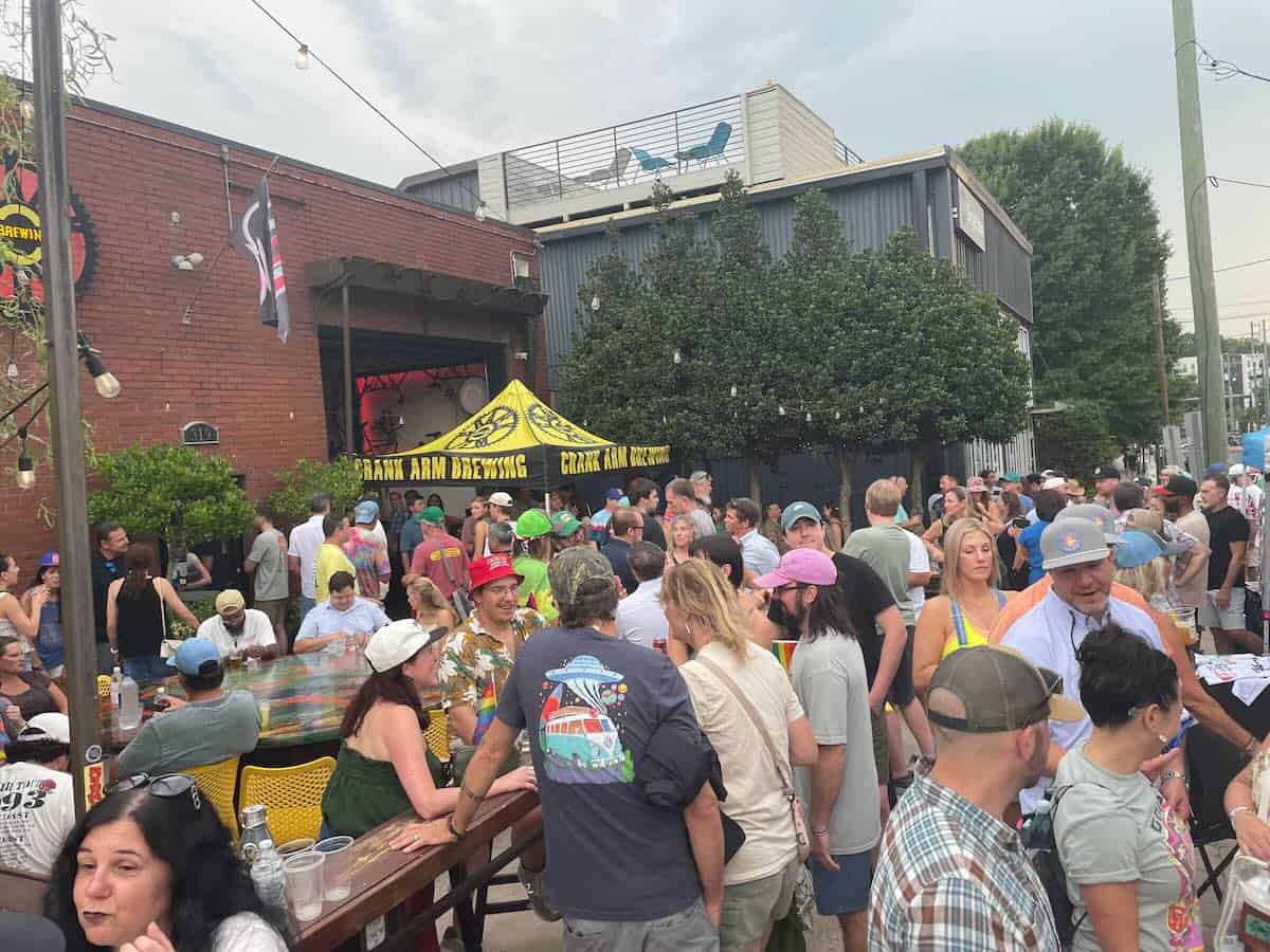 People on patio of Crank Arm Brewing