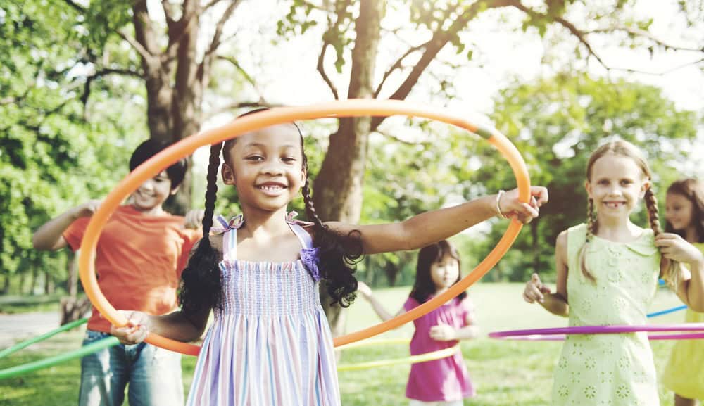 kids playing with hula hoops