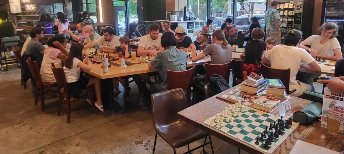 People playing chess at Durham Food Hall