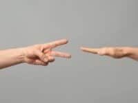 hands playing rock, paper scissors